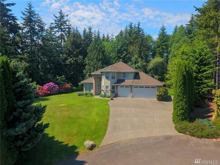 Property Photo:  891 NE Boulder Ridge Ct  WA 98370 