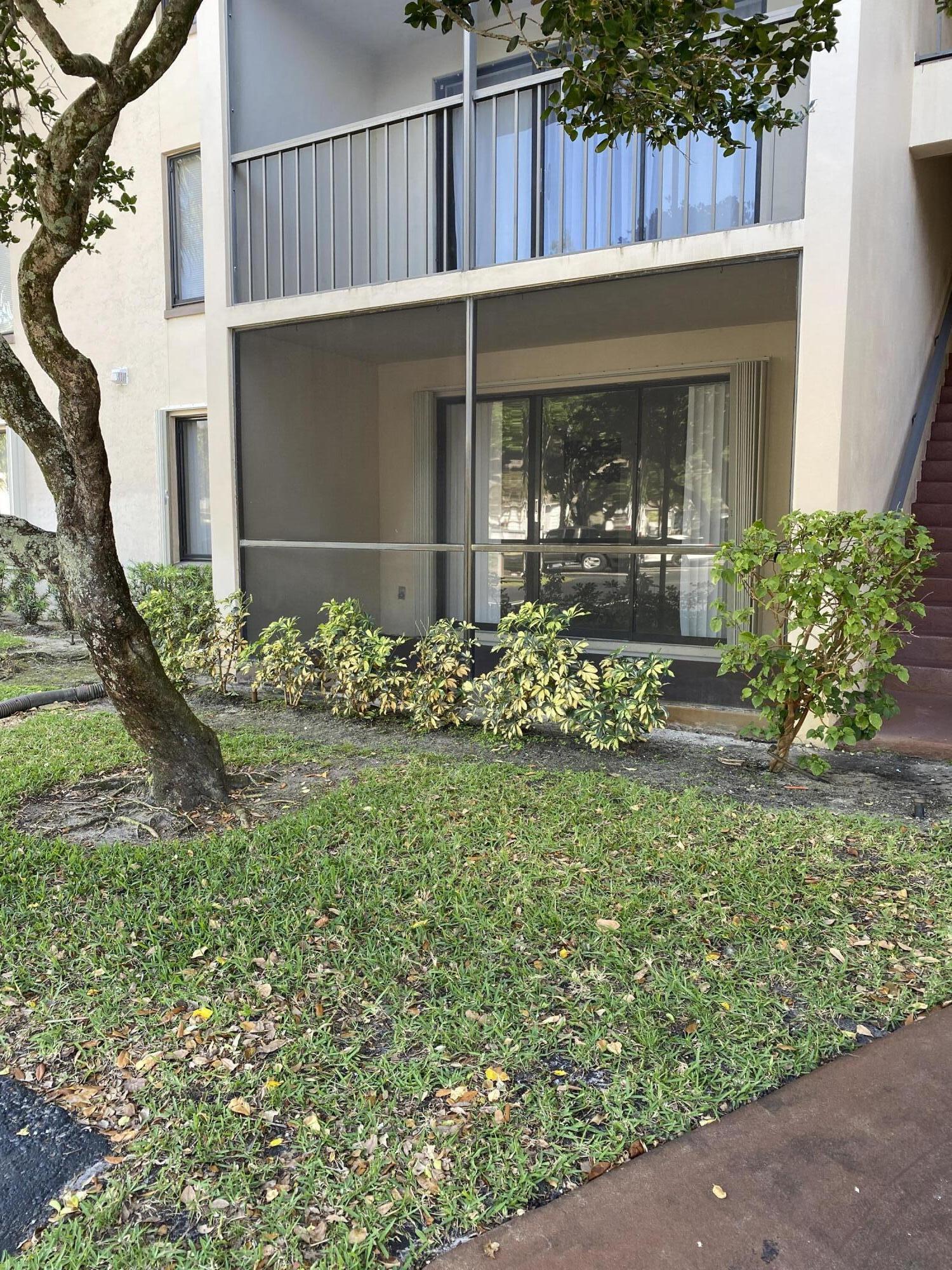 Property Photo: 207 Foxtail Drive A1 FL 33415