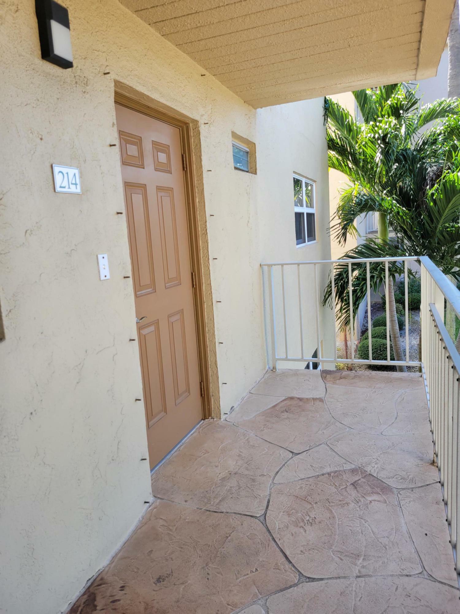 Property Photo:  330 NE 26th Avenue 214  FL 33435 