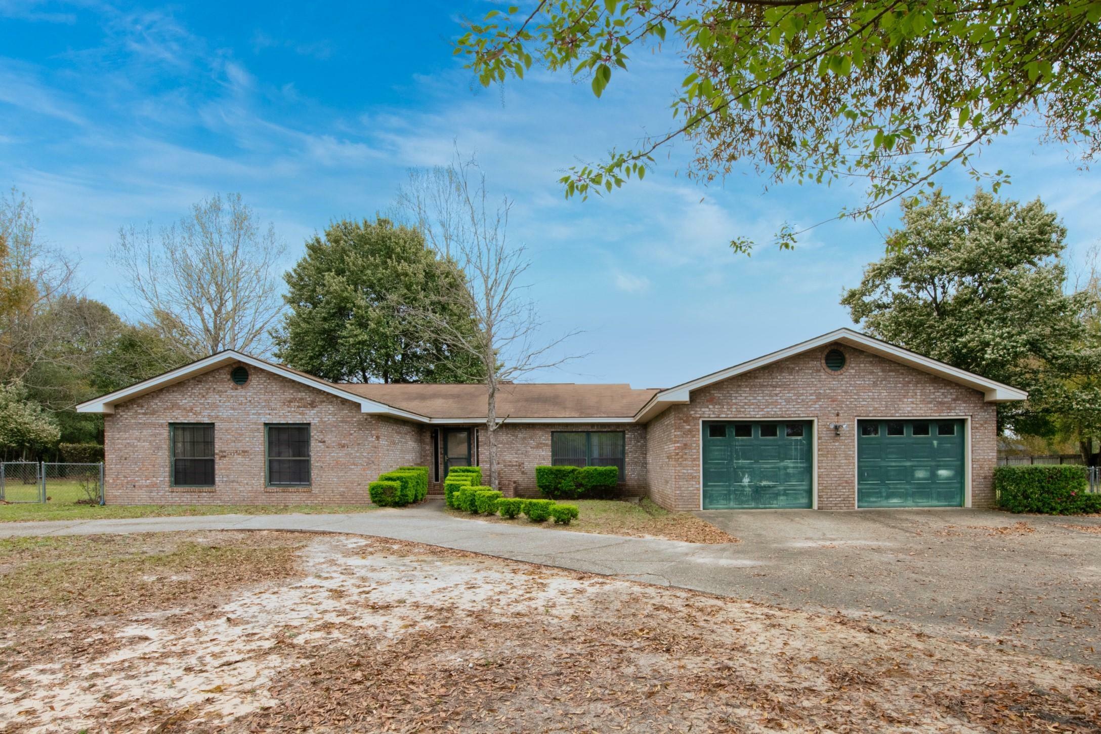 Property Photo:  1306 Sunshine Drive  FL 32539 