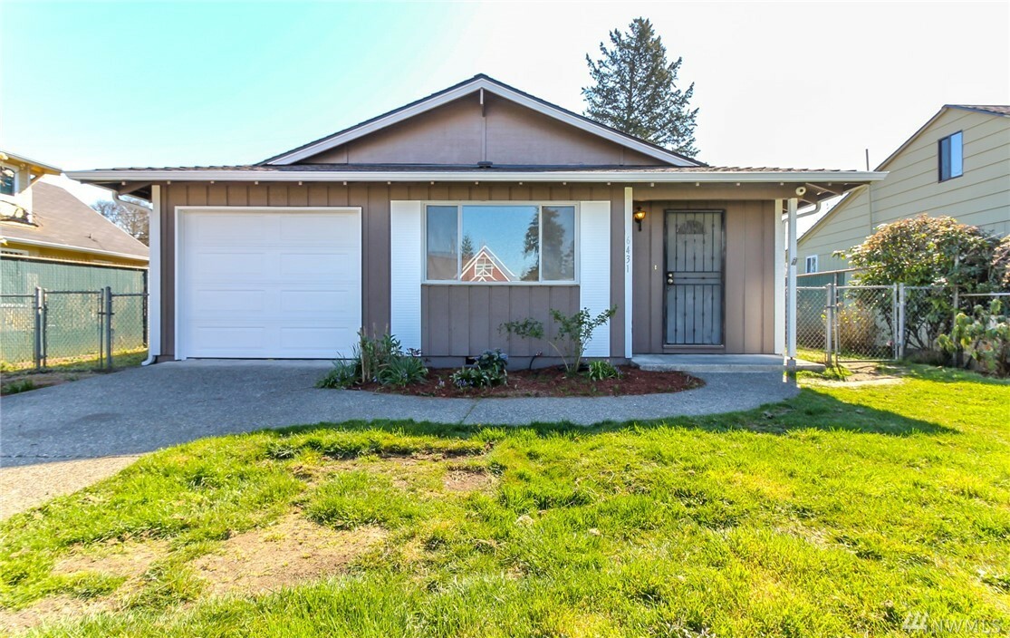 Property Photo:  6431 S Stevens St  WA 98409 