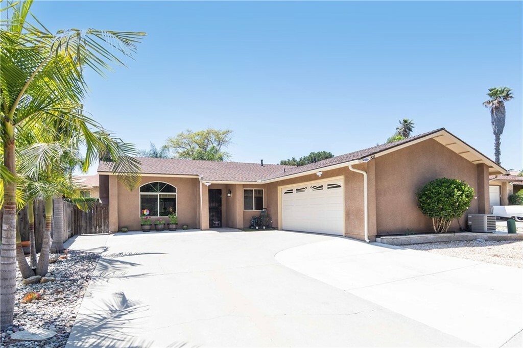 Property Photo:  831 Shade Tree Lane  CA 92028 