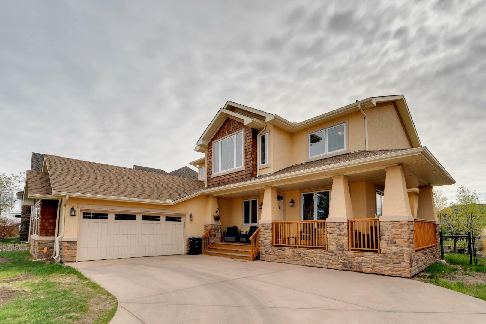 Property Photo: 36 Cimarron Estates Way AB T1S 2P4