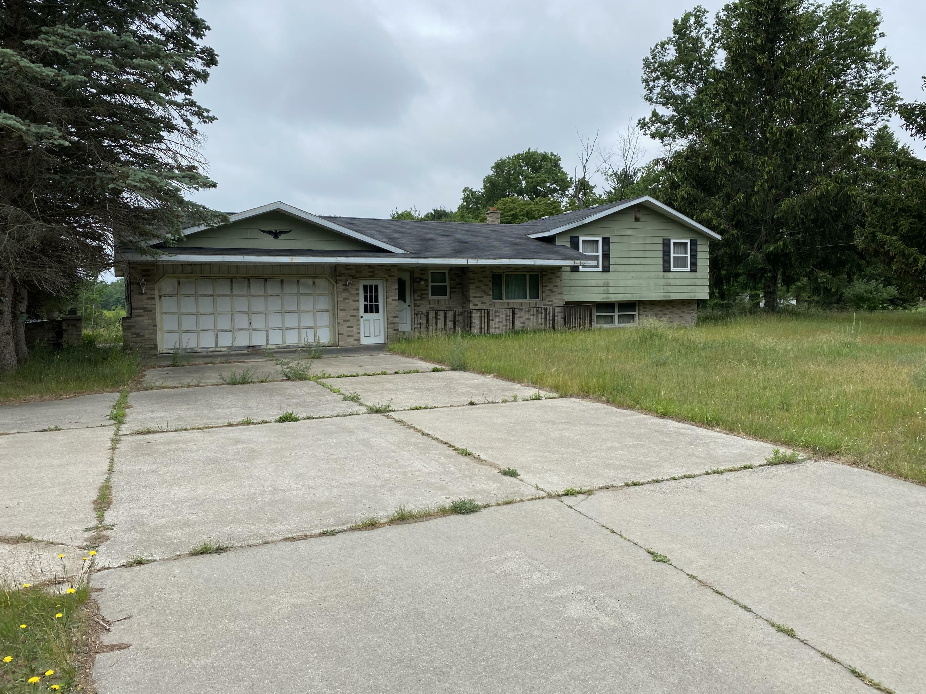 Property Photo:  2115 E Sternberg Road  MI 49444 