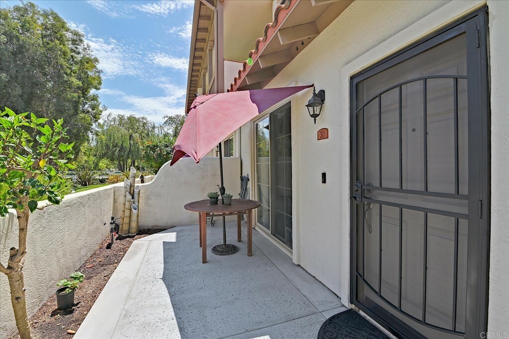 Property Photo:  1469 Rancho Rose Way 30  CA 92057 