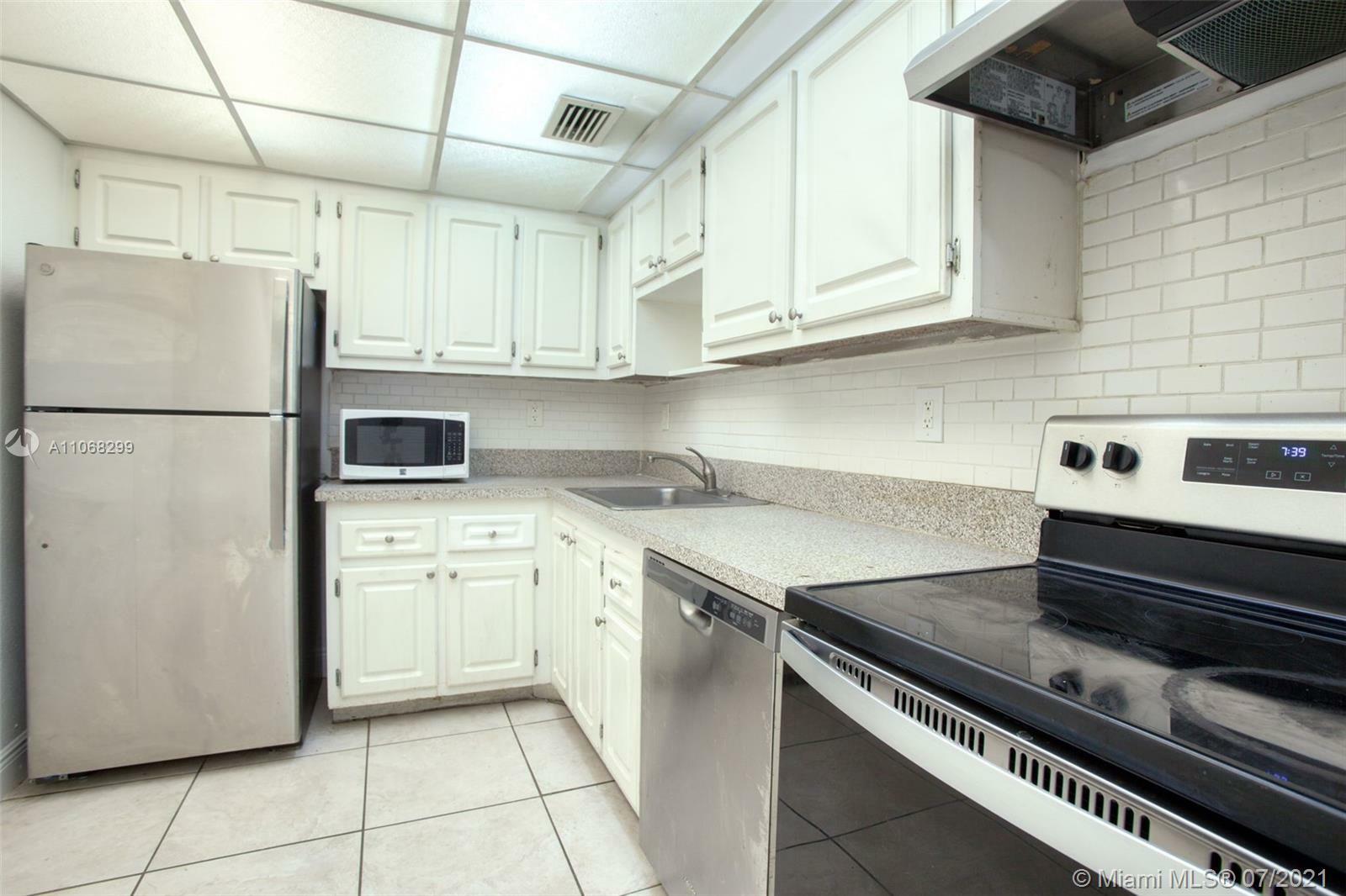 Property Photo:  1805 Sans Souci Blvd 227  FL 33181 