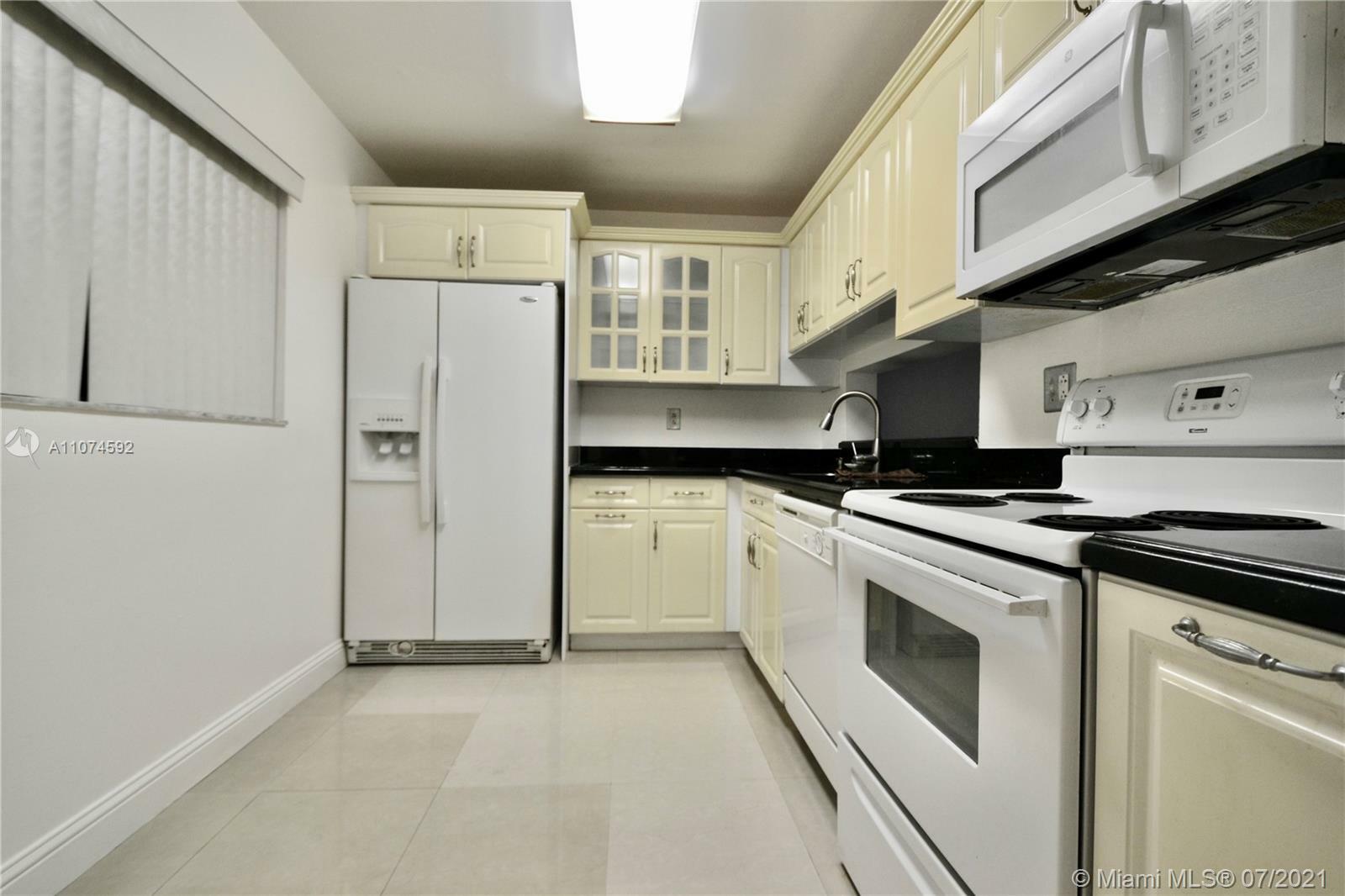 Property Photo:  8520 SW 133rd Ave Rd 305  FL 33183 