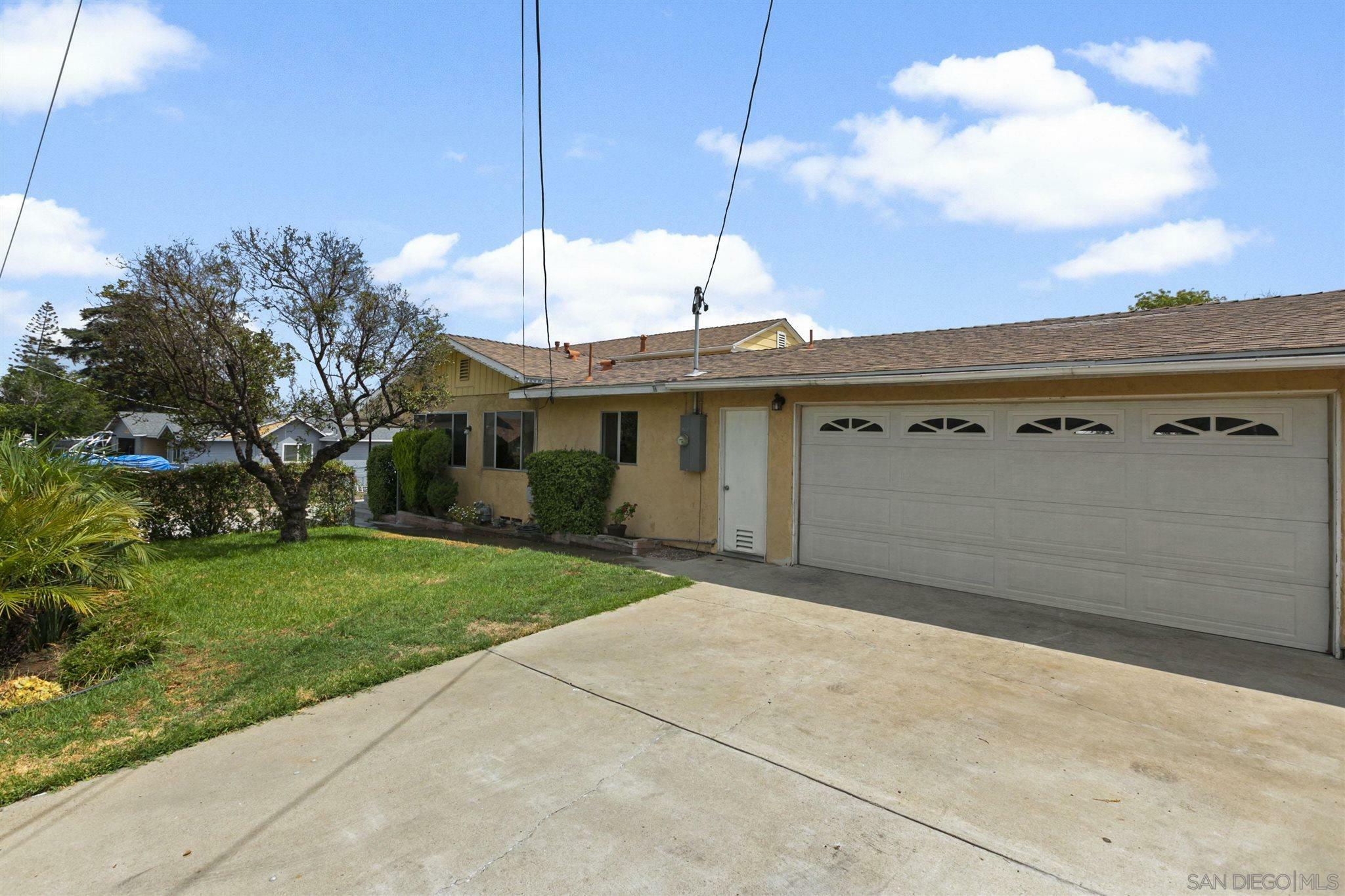 Property Photo:  8657 Almond Rd  CA 92040 