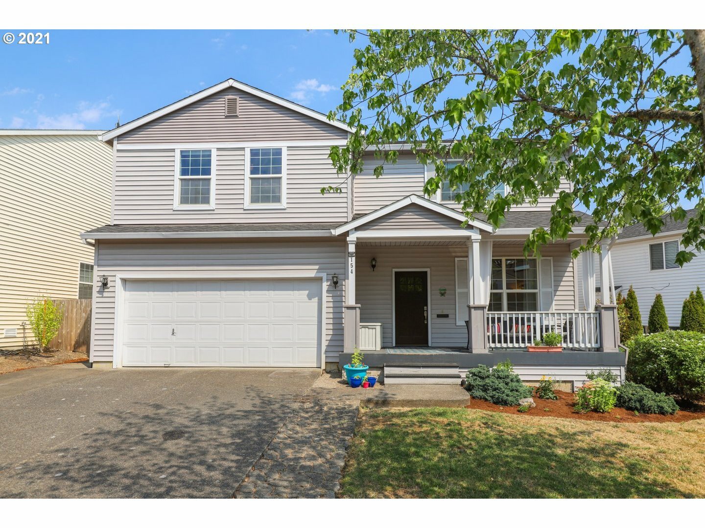 Property Photo: 154 NE Woodsong St OR 97124