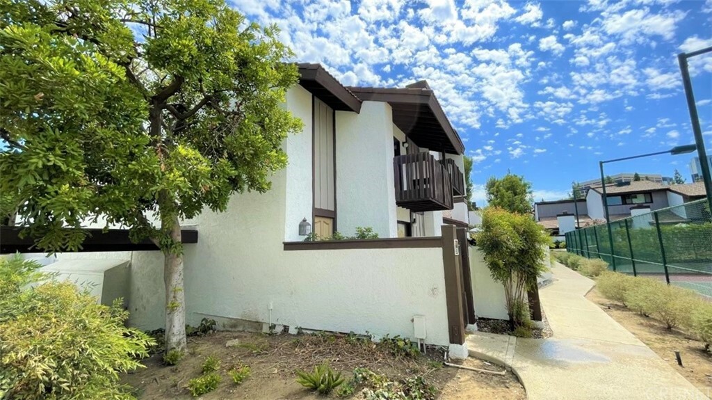 Property Photo:  6265 Canoga Avenue 52  CA 91367 