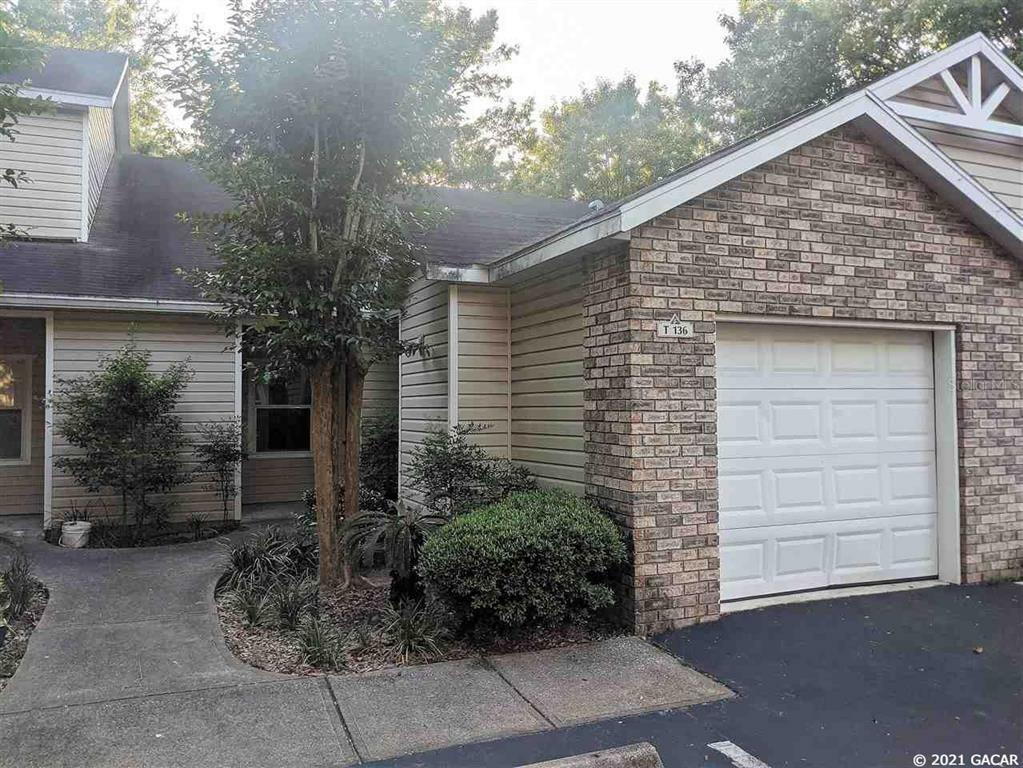 Property Photo:  4700 SW Archer T136  FL 32608 