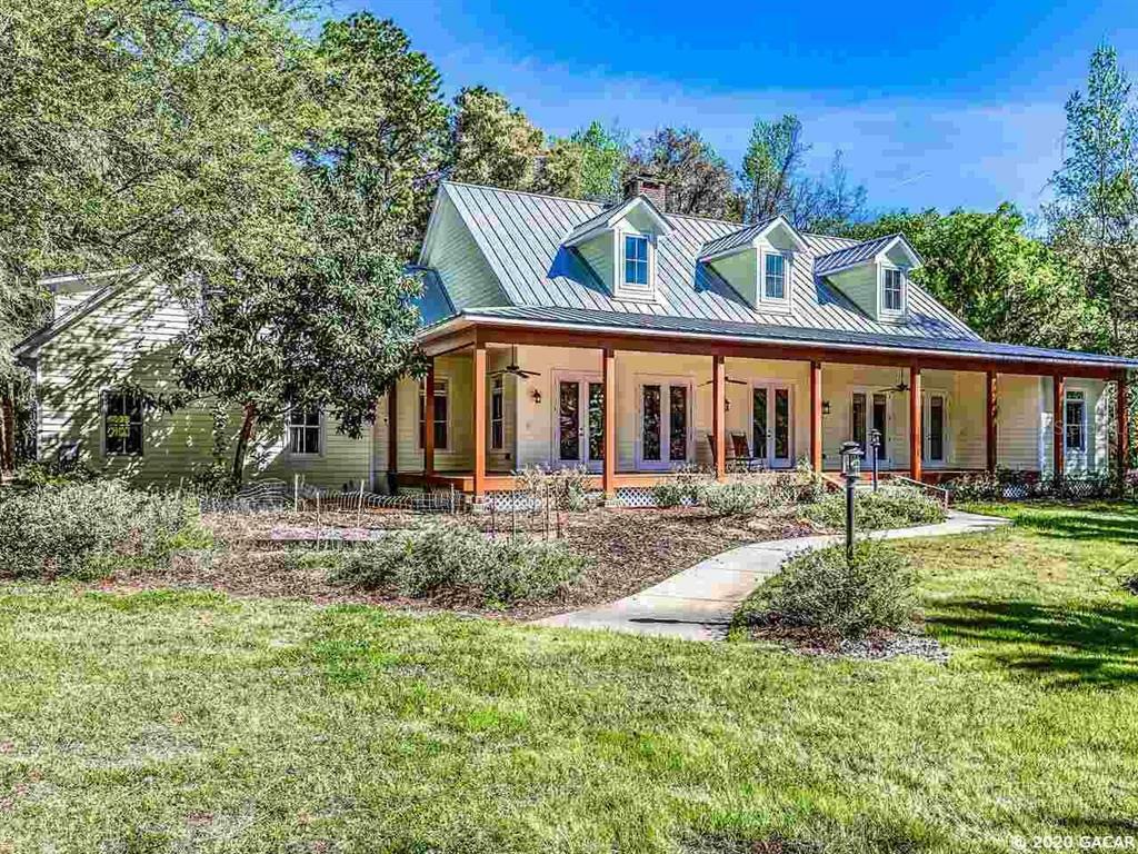 Property Photo:  2058 SW 56th Avenue  FL 32608 