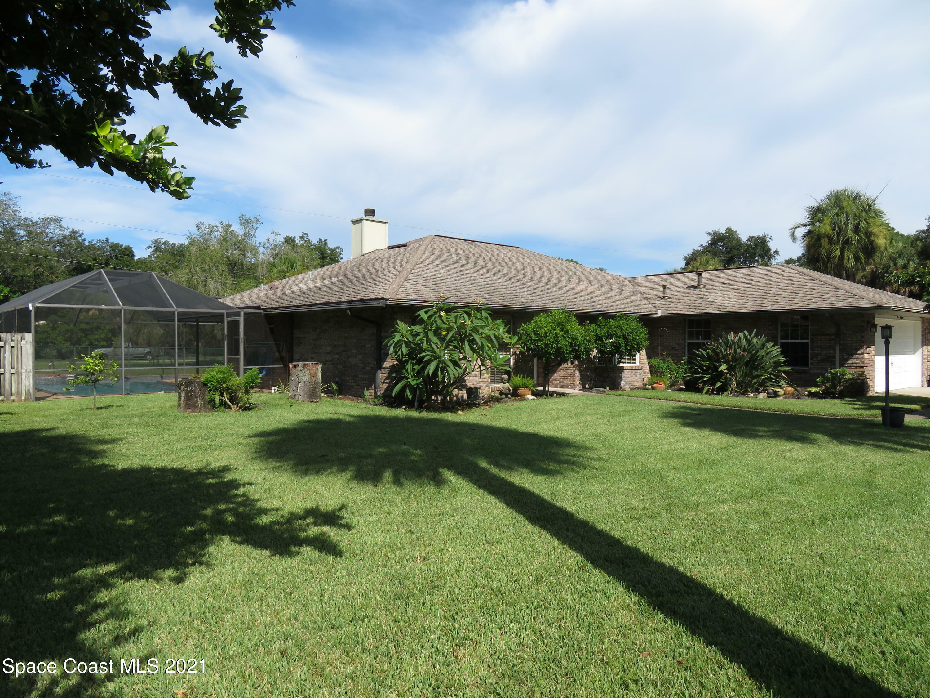 Property Photo:  1895 Whispering Oaks Circle  FL 32934 