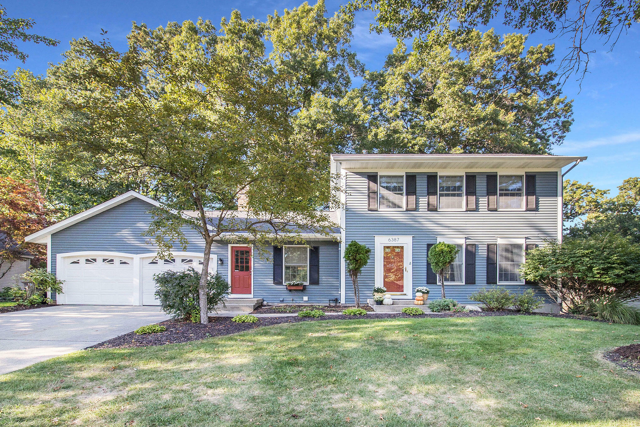 Property Photo: 6387 Scarborough Drive SE MI 49301