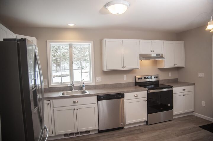Property Photo: 4 Mill Pond Road NH 03850