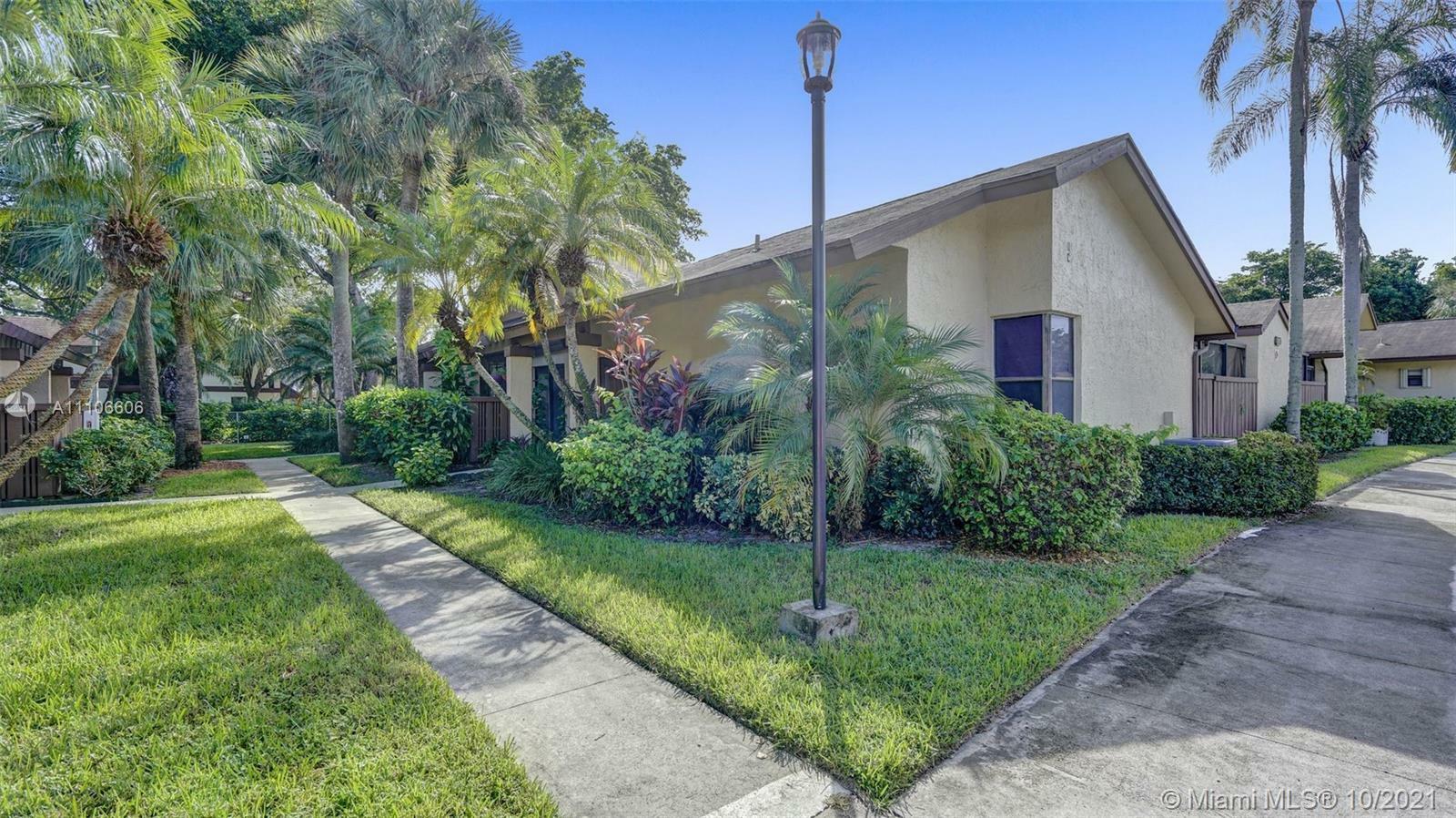 Property Photo:  3957 Cocoplum Cir D  FL 33063 