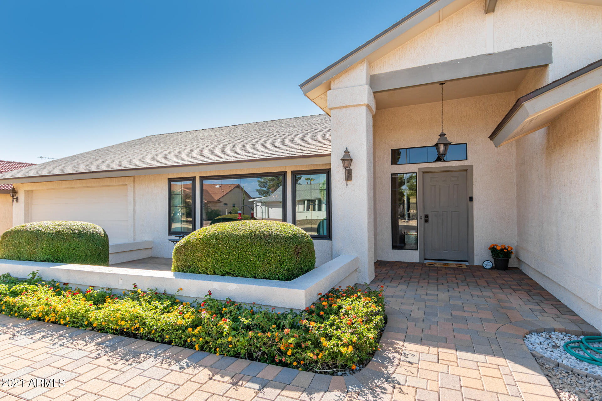 Property Photo: 18018 N 136th Drive AZ 85375