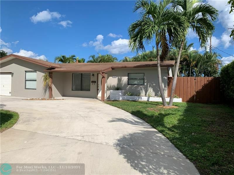 Property Photo:  3320 NE 14th Ave  FL 33064 