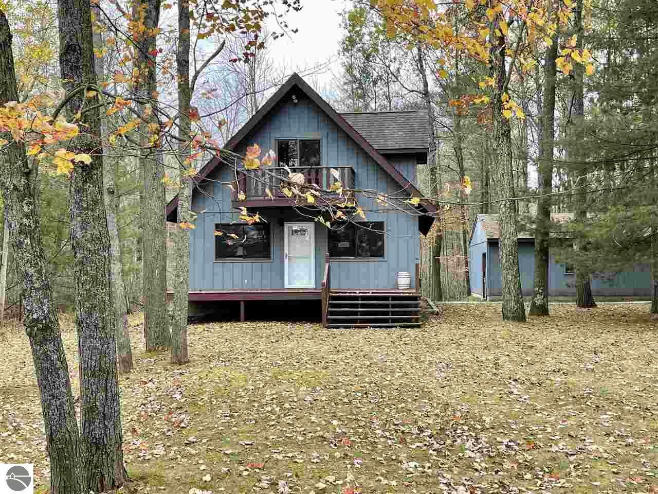 Property Photo:  150 Woodland Drive  MI 49601 