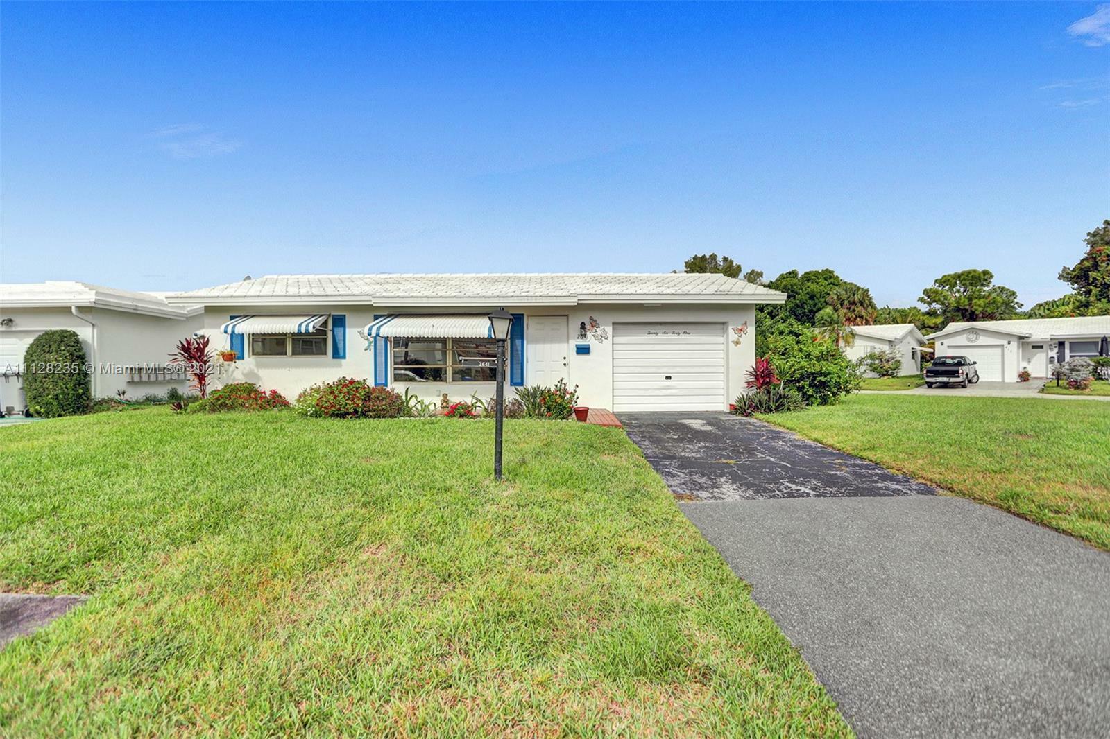 Property Photo:  2641 W Golf Blvd  FL 33064 