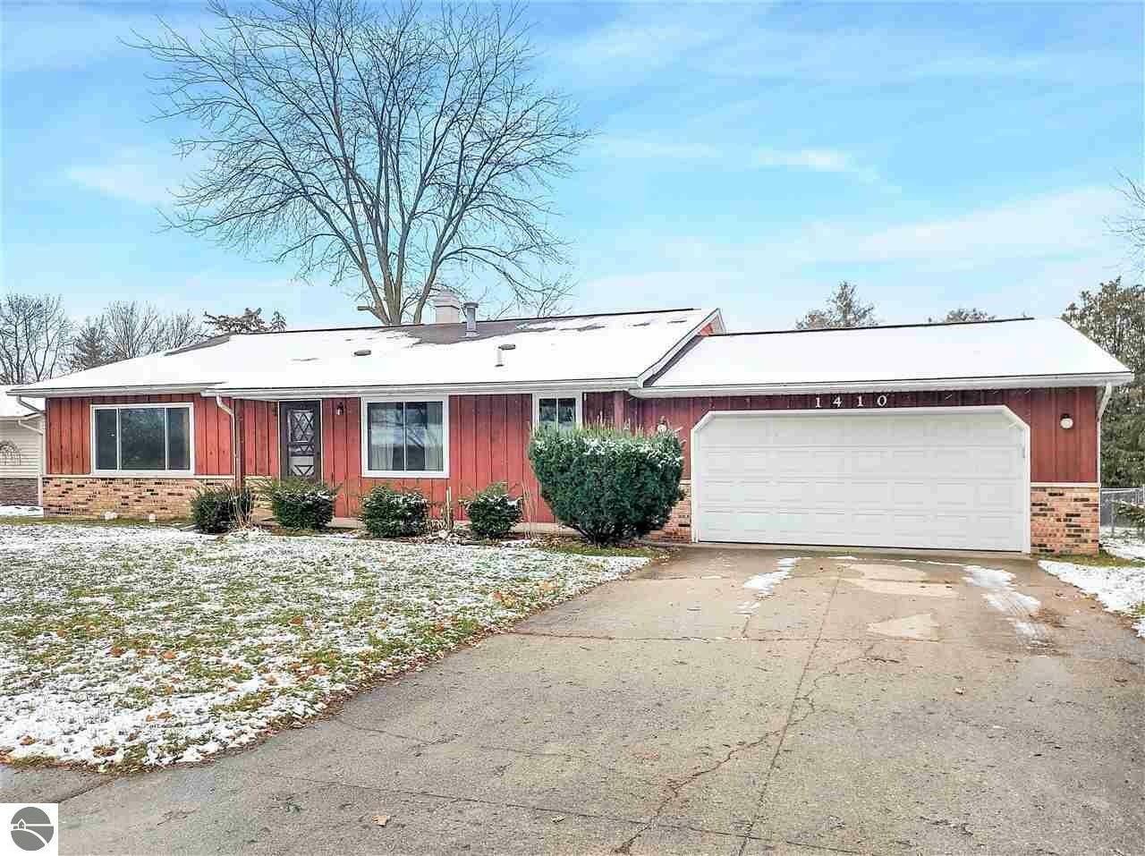 Property Photo:  1410 Illinois Court  MI 48858 