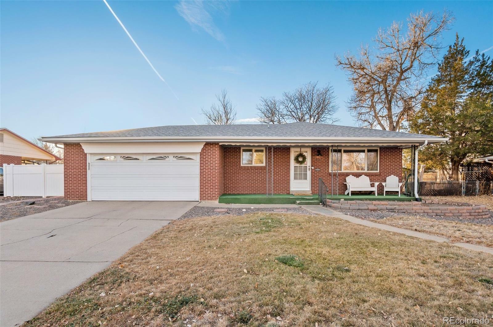 Property Photo: 507 Tucson Street CO 80011