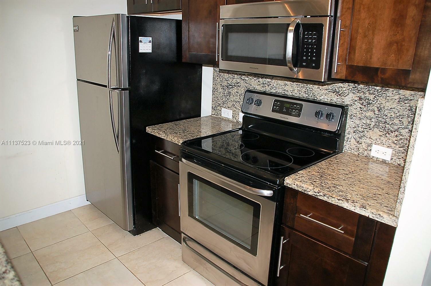 Property Photo:  720 SW 111th Ave 303  FL 33025 