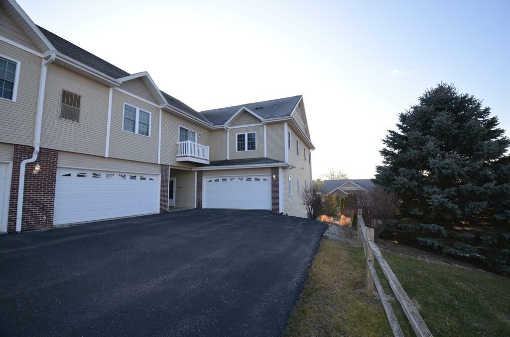 Property Photo: 327 E Clay St 30 WI 53190