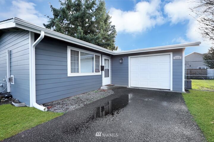 Property Photo: 4408 S Burkhart Drive WA 98409