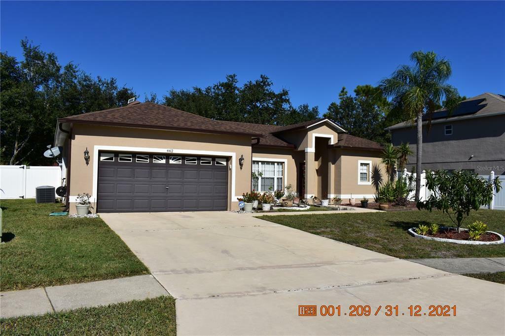 Property Photo:  442 Acacia Tree Way  FL 34758 