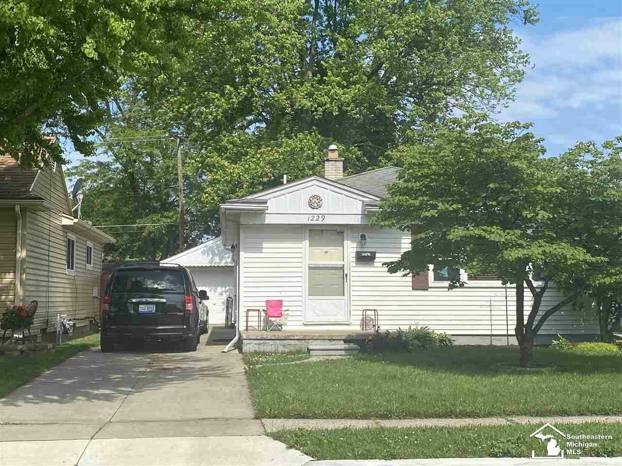 Property Photo:  1229 Maple Ave.  MI 48162 