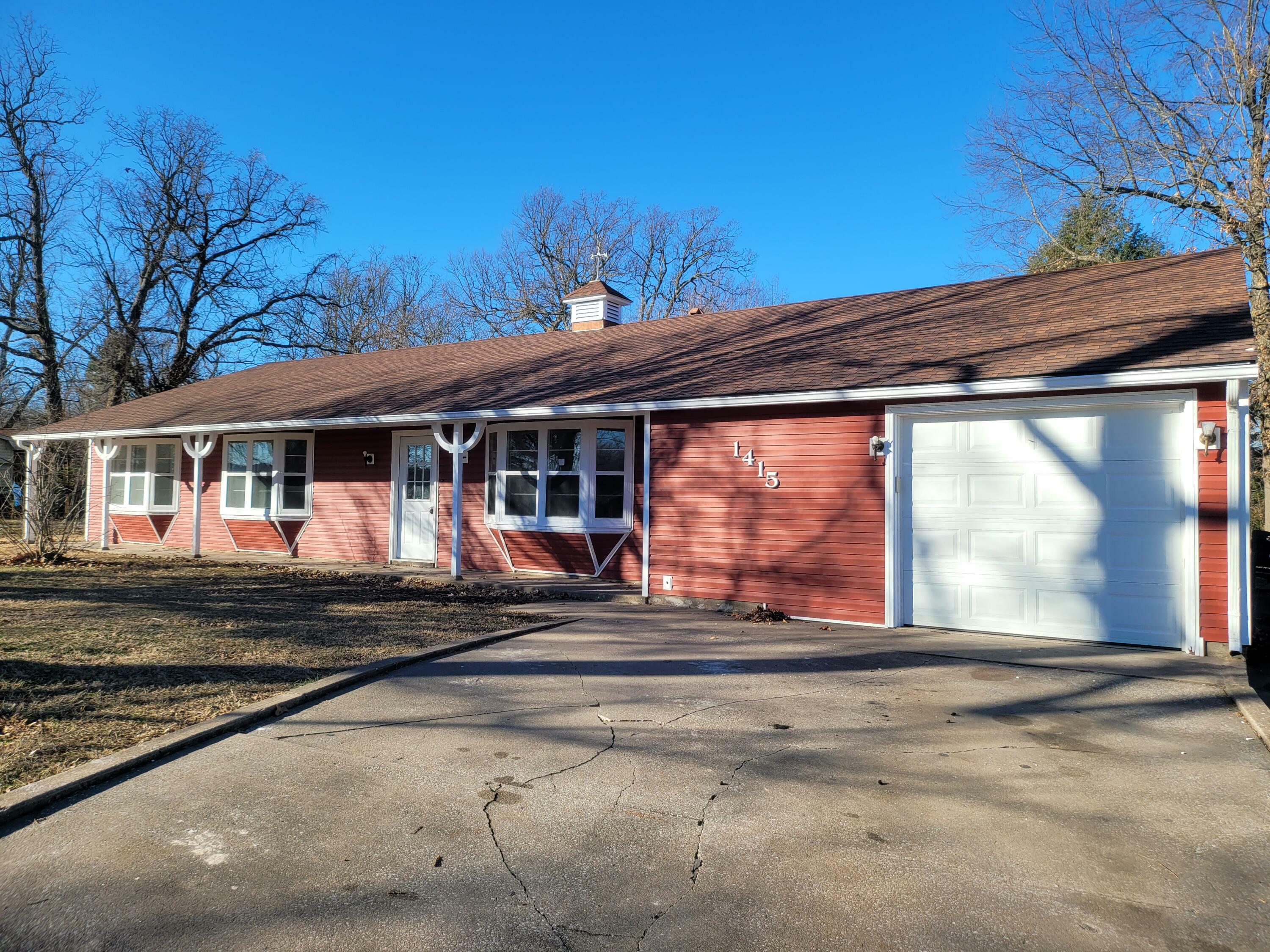 Property Photo:  1415 S Jefferson Avenue  MO 65605 