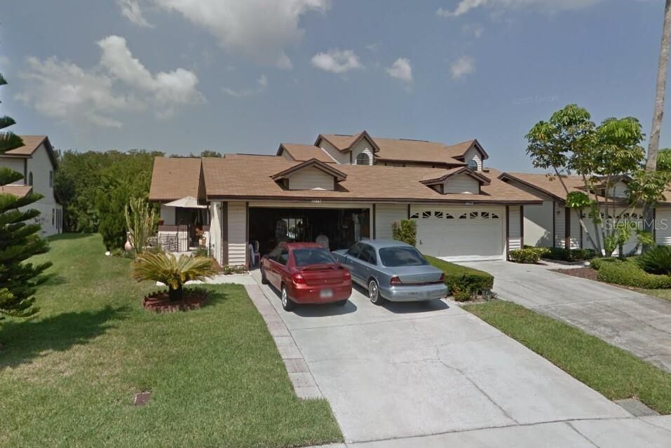 Property Photo:  14867 Feather Cove Road  FL 33762 