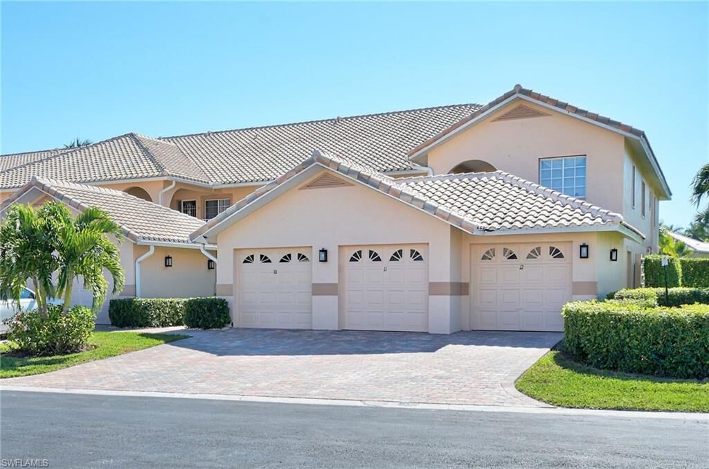 Property Photo:  9022 Michael Cir 2-210  FL 34113 