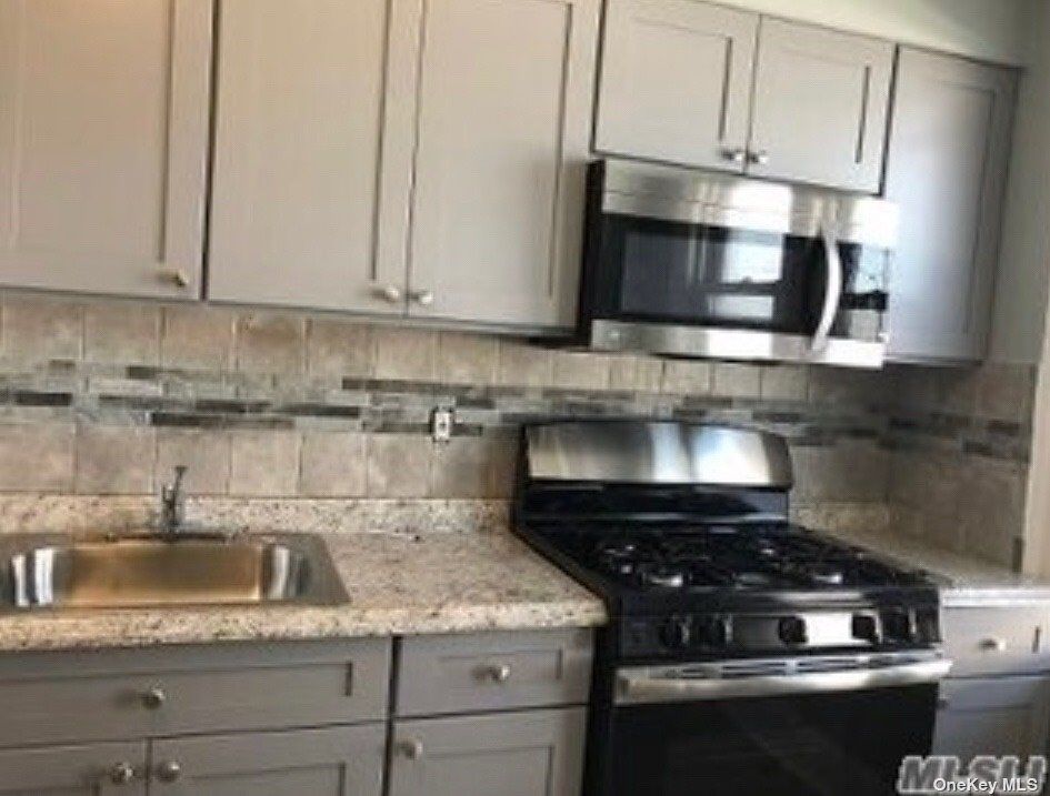 Property Photo:  134 Jericho Turnpike  NY 11501 