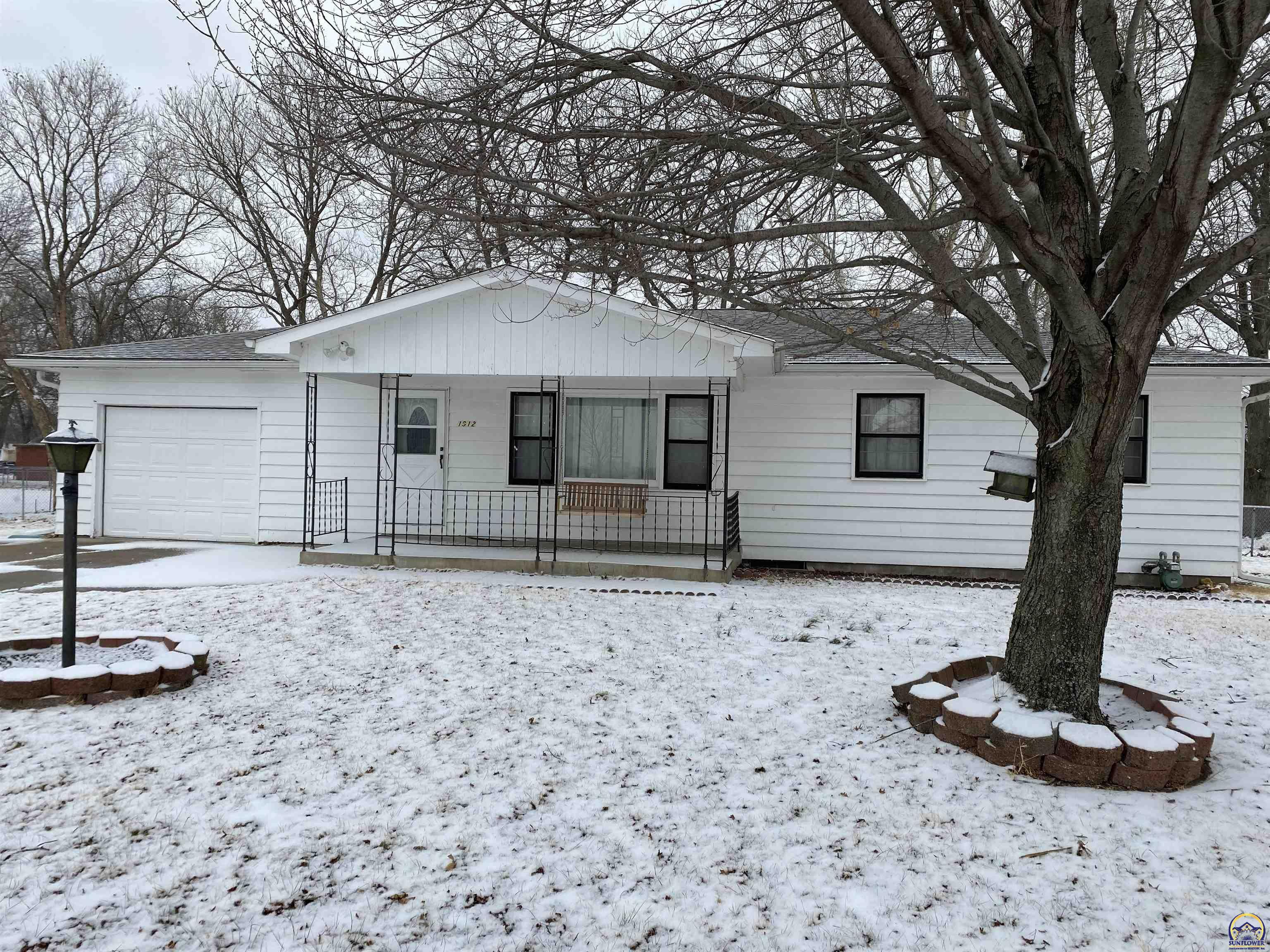 Property Photo:  1912 NW Winter St  KS 66608 