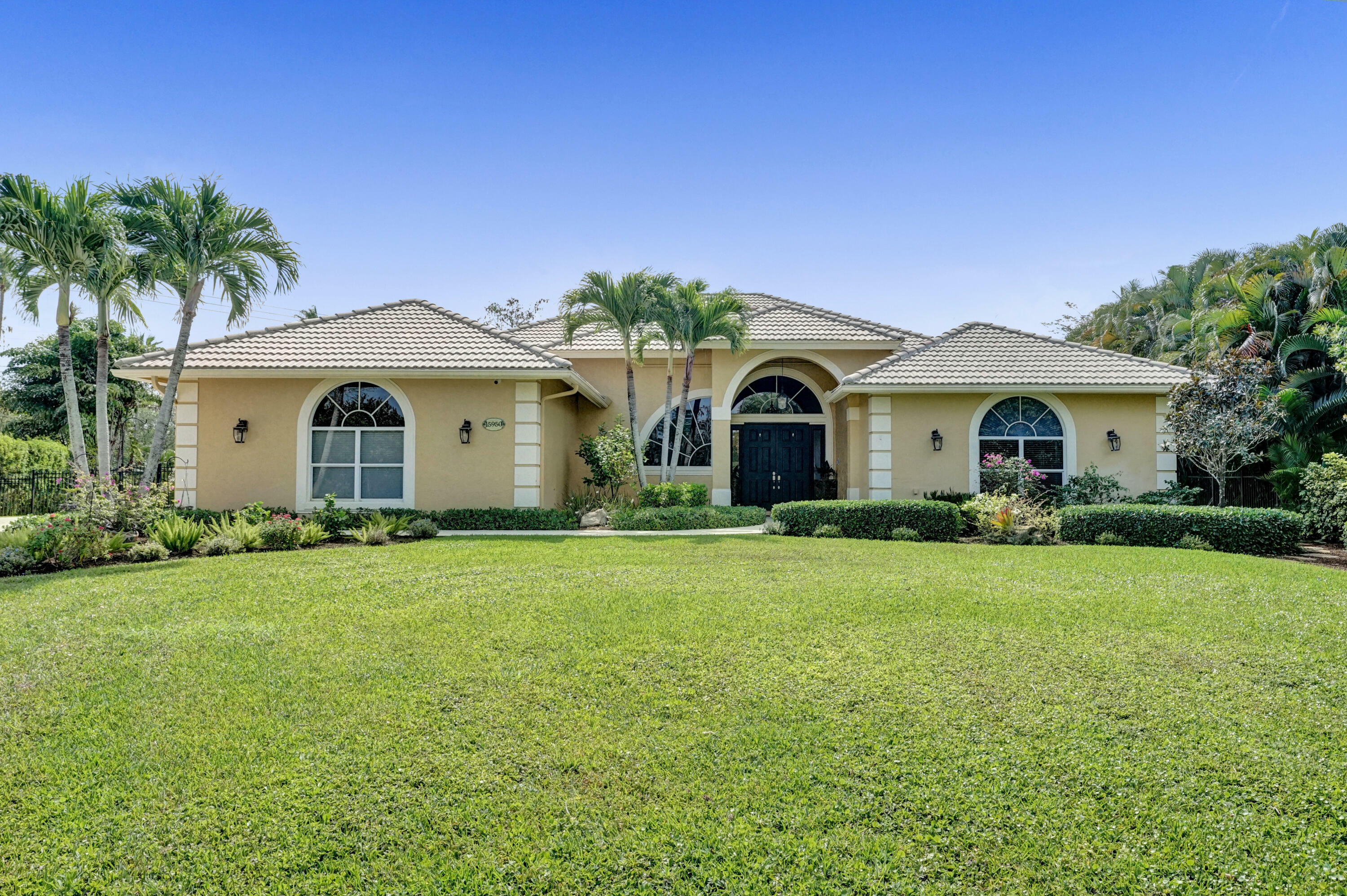 Property Photo:  15950 Meadow Wood Drive  FL 33414 