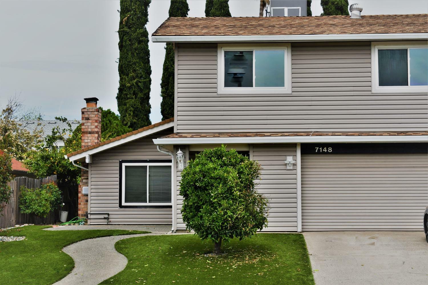 Property Photo:  7148 Woodmore Oaks Drive  CA 95610 