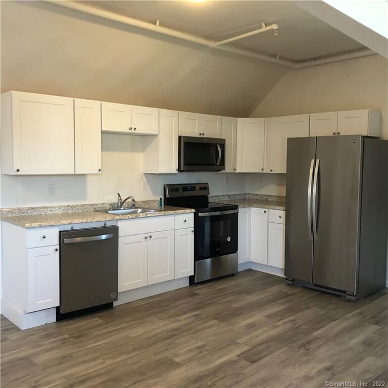 Property Photo: 166-168 Bridgeport Avenue 3 CT 06460