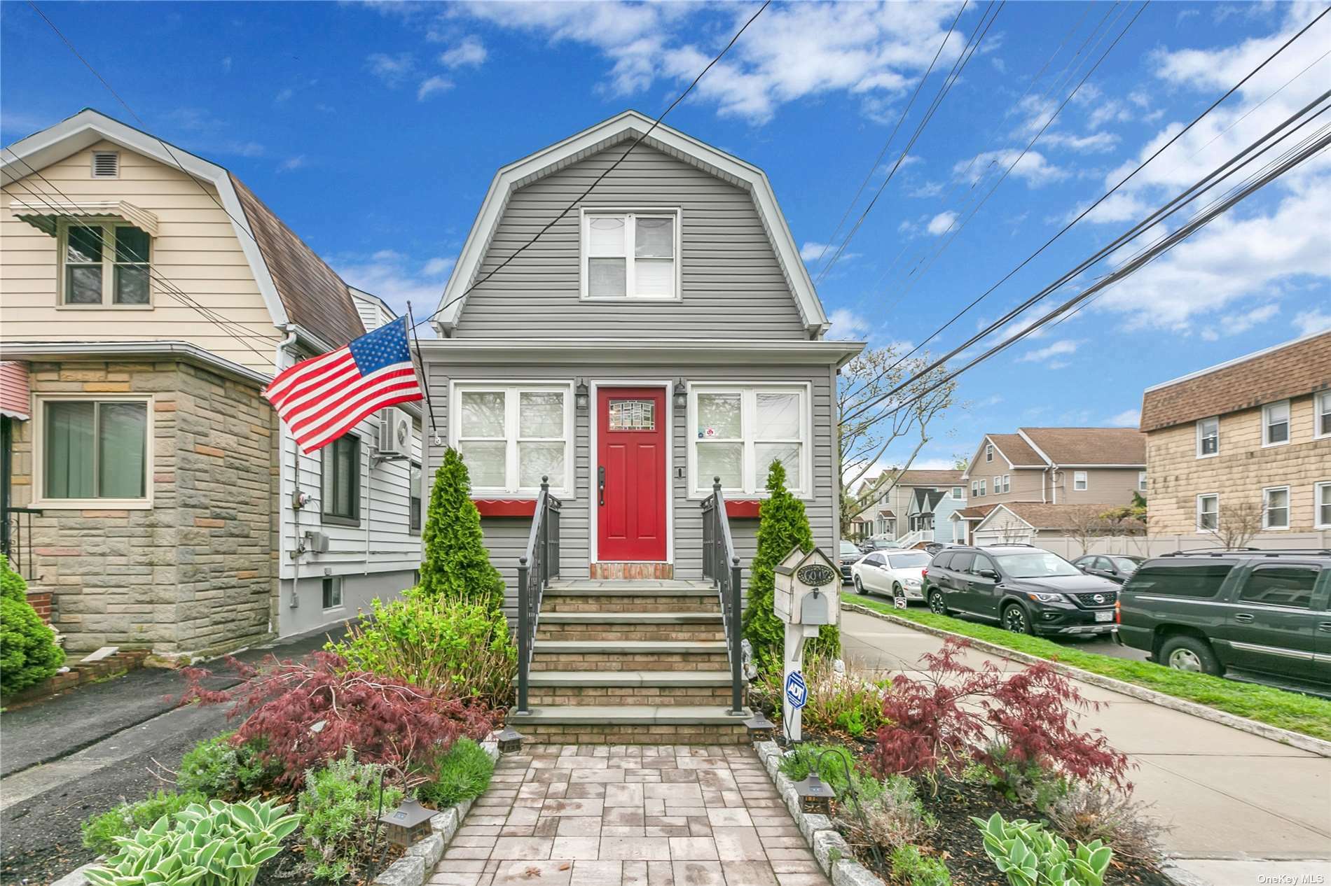 Property Photo:  60-02 69th Street  NY 11378 