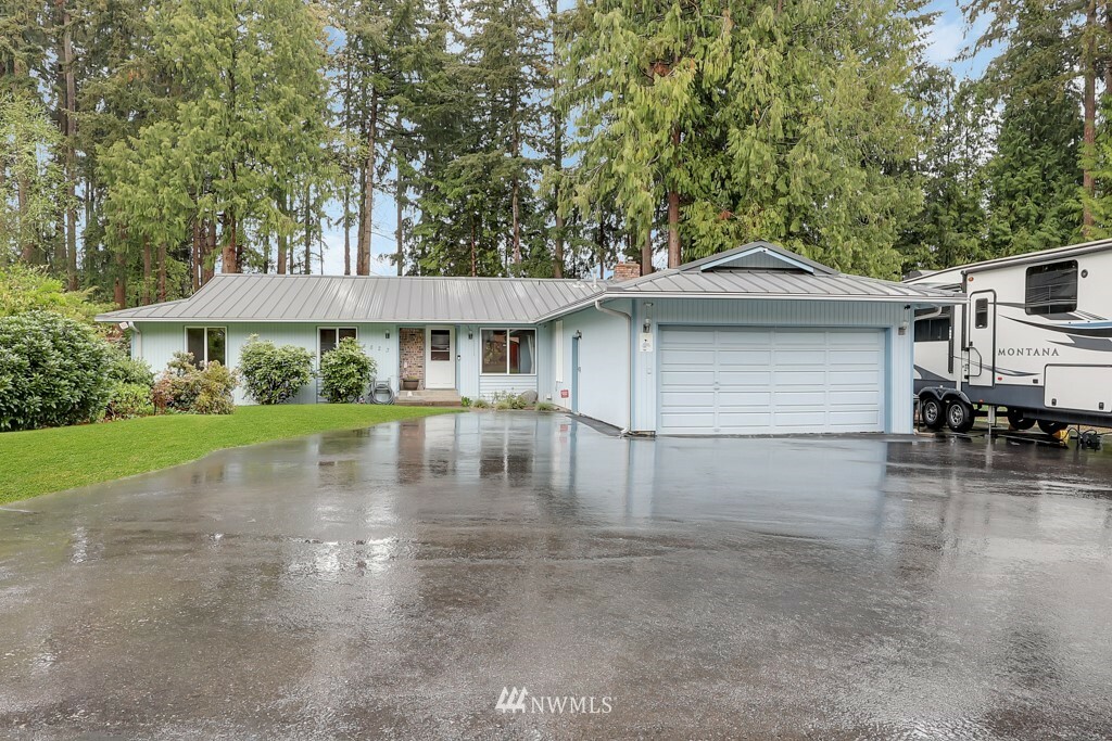 Property Photo:  4823 W Tapps Drive E  WA 98391 