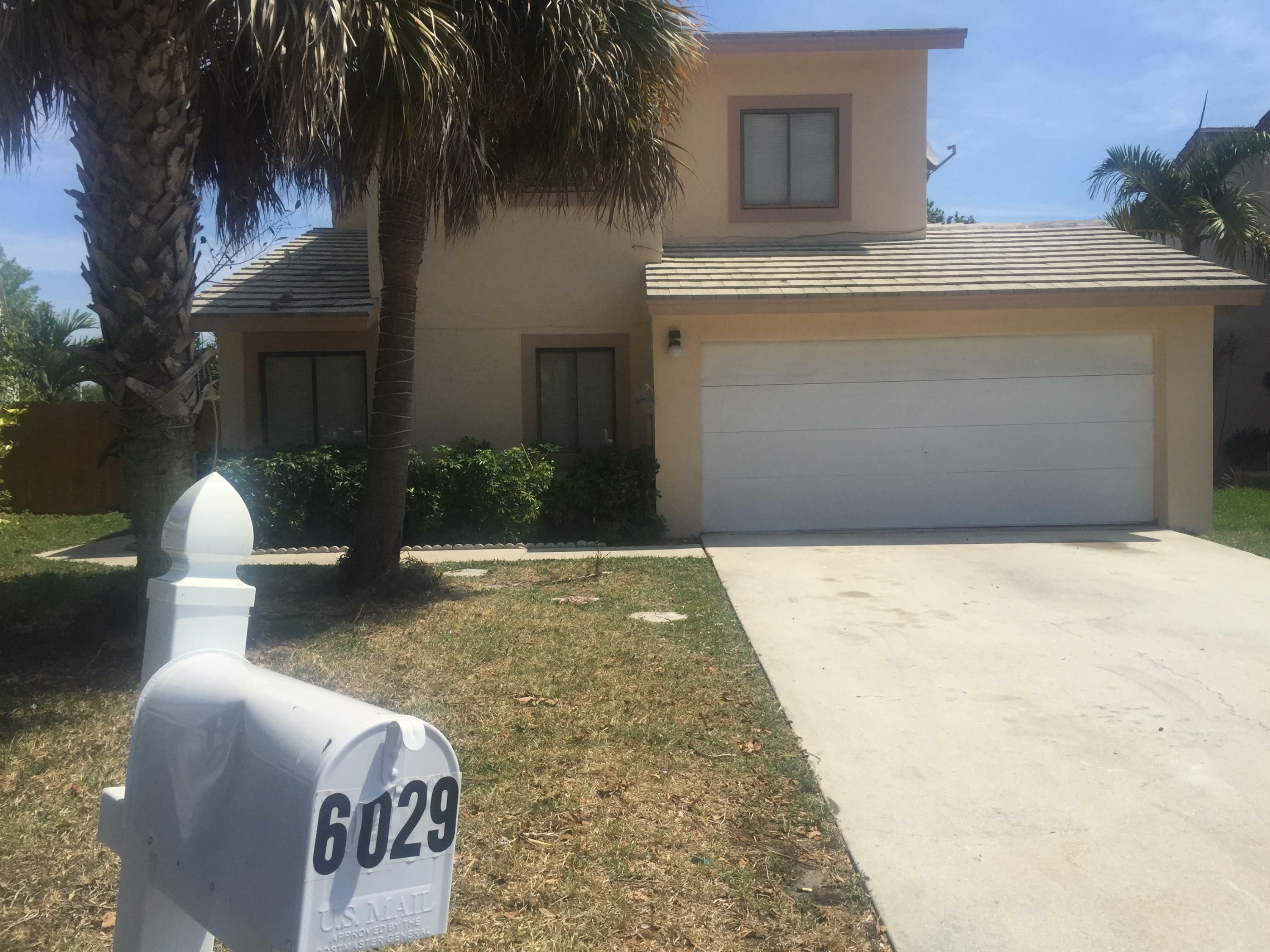 Property Photo:  6029 Strawberry Fields Way  FL 33463 