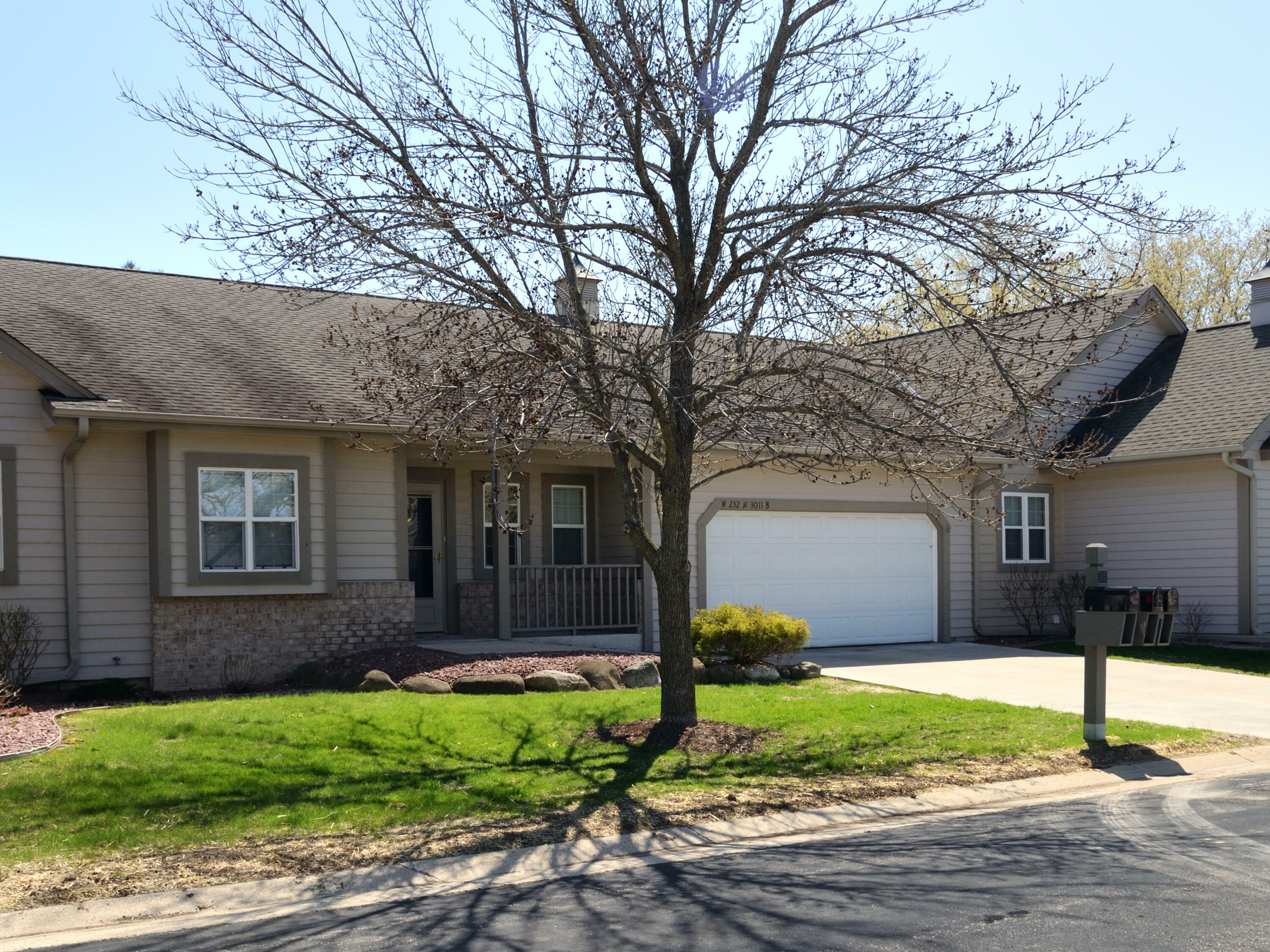 Property Photo: W232n3011 Emerald Ln B WI 53072