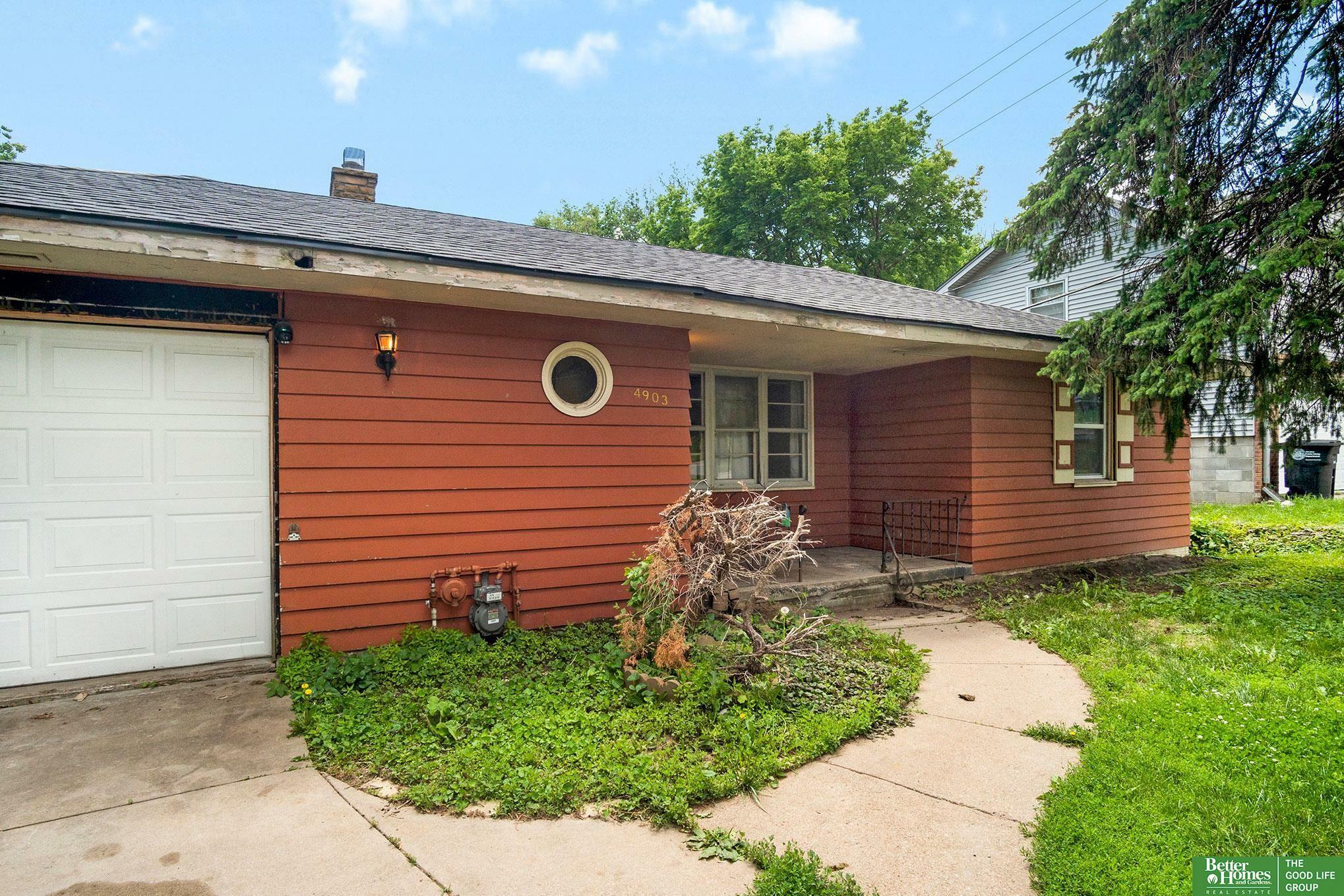 Property Photo:  4903 Grand  NE 68104 