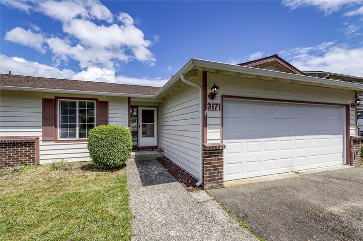 Property Photo: 3171 SE Villa Carmel Drive WA 98366