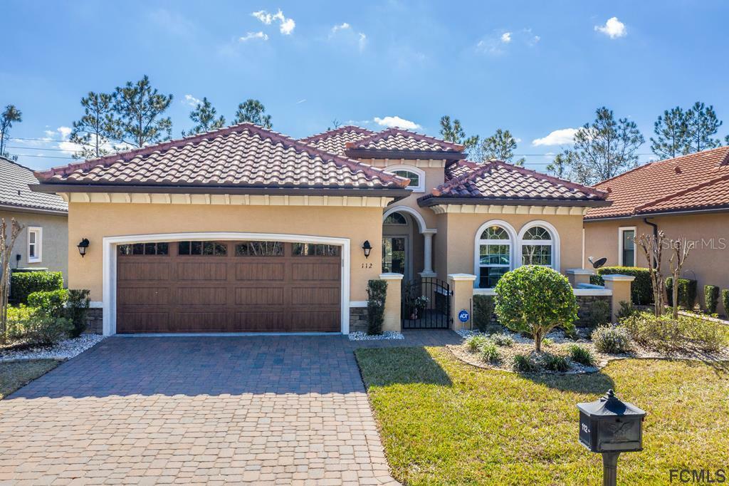 Property Photo:  112 Via Roma  FL 32174 