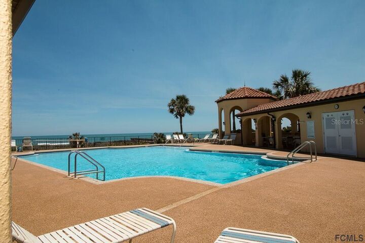 Property Photo: 104 Surfview Drive 1102 FL 32137