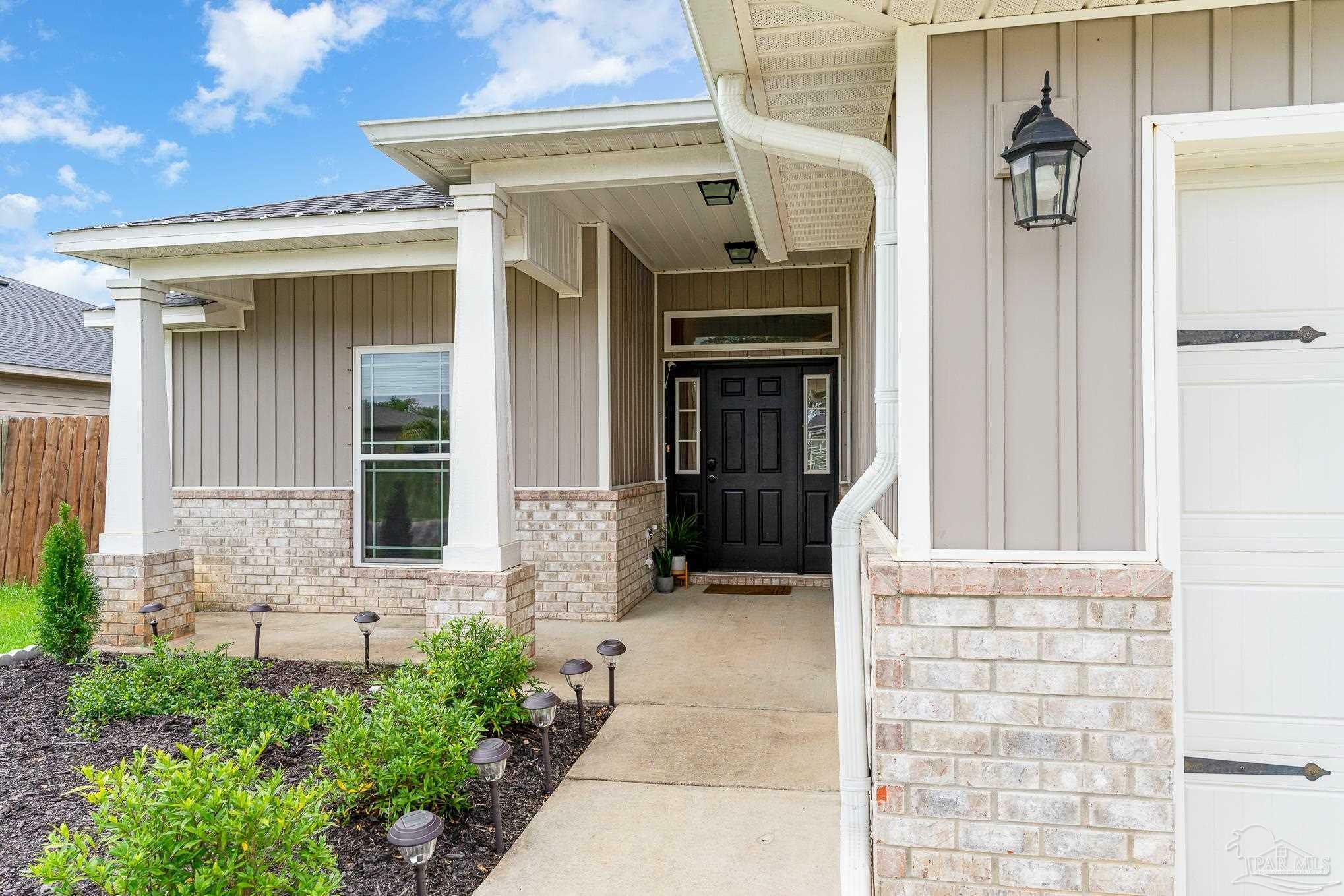 Property Photo:  5571 Peach Dr  FL 32571 