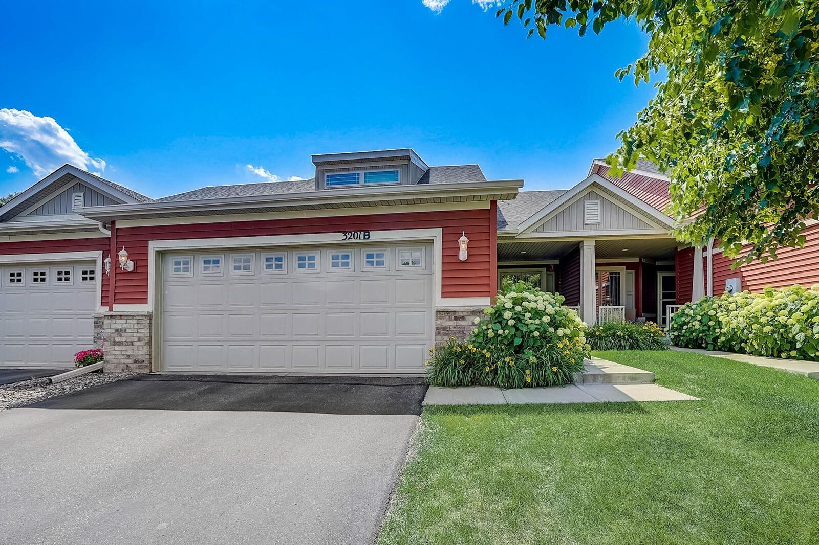 Property Photo:  3201 126th Avenue NE B  MN 55449 