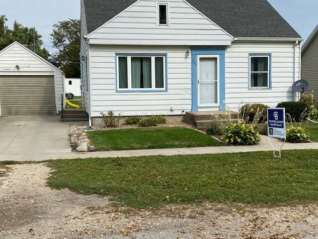 Property Photo:  306 E 1st Ave  IA 52253 
